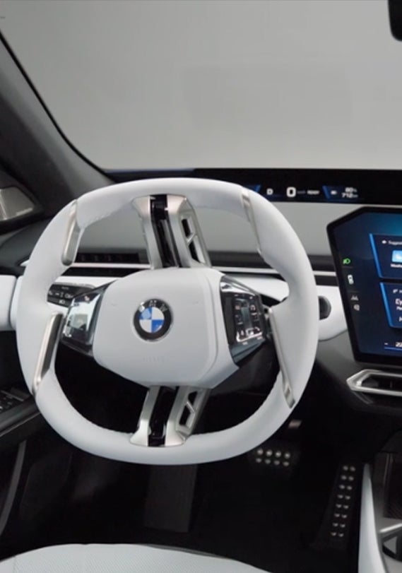 Close up of BMW i3 Central display and steering wheel.